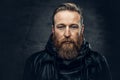 Redhead bearded male in leather jacket. Royalty Free Stock Photo