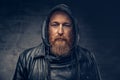 Redhead bearded male in leather jacket. Royalty Free Stock Photo