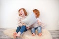 Redhead children throw pillows Royalty Free Stock Photo