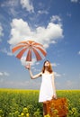 Redhead enchantress with umbrella Royalty Free Stock Photo