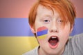 Redhead fan boy with armenian flag painted on his face Royalty Free Stock Photo