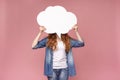 Redhead female hiding her face behind blank white speech bubble Royalty Free Stock Photo