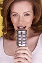 Redhead female singer. Royalty Free Stock Photo