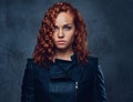 Redhead female supervisor dressed in an elegant suit. Royalty Free Stock Photo