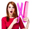 Redhead girl with big scissors and comb Royalty Free Stock Photo