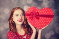 Redhead girl with gift for Valentines Day Royalty Free Stock Photo