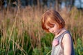 Girl looking down thoughtfully Royalty Free Stock Photo