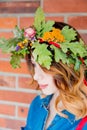 Redhead girl with oak leaves wreath at Germany Unity day Royalty Free Stock Photo