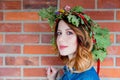 Redhead girl with oak leaves wreath at Germany Unity day Royalty Free Stock Photo