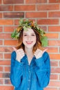 Redhead girl with oak leaves wreath at Germany Unity day Royalty Free Stock Photo