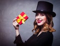 Redhead girl in top hat with gift box Royalty Free Stock Photo