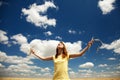 Redhead girl at wheat field in summer day. Royalty Free Stock Photo