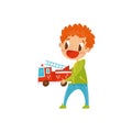 Redhead little boy playing wirh fire truck, cute cartoon character vector Illustration on a white background Royalty Free Stock Photo