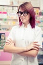 Redhead pharmacist with eyeglasess