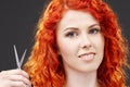 Redhead with scissors #2 Royalty Free Stock Photo