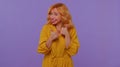 Redhead stylish girl showing inviting gesture with hands, ask to join, beckoning to coming, welcome
