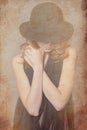 Redhead woman in black hat and clother