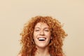 Redhead Woman. Cheerful Girl Close Up Portrait. Beautiful Female With Curly Red Hair Looking At Camera.