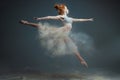 Redhead woman dancer in dust Royalty Free Stock Photo