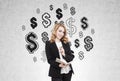 Redhead woman and dollar sign on concrete wall Royalty Free Stock Photo