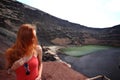 Redhead woman on El Golfo on Lanzarote Island, Spain