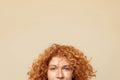 Redhead Woman. Ginger Hair Girl Cropped Close Up Portrait. Beautiful Blue-Eyed Female With Curly Hairdo.