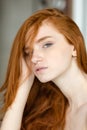 Redhead woman looking at camera Royalty Free Stock Photo