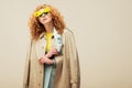 Redhead woman in trench coat and Royalty Free Stock Photo