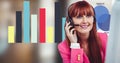 Redhead woman using headphones with graph in background Royalty Free Stock Photo