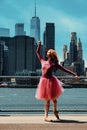 redhead young girl posing at city street downtown New York City financial district Royalty Free Stock Photo