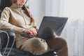 Redheaded woman with laptop working from home, freelance, social distancing and remote work concept Royalty Free Stock Photo