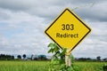 303 Redirect street sign and rices field in the background