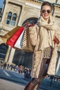 Tourist woman at Piazza del Duomo in Milan, Italy standing