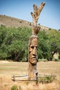 Redman is a landmark 37 foot tall wooden folk art carving by Peter Toth of a Native American in Loveland