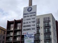 Redmond, WA USA - circa March 2021: Low angle view of public parking rates in a lot near downtown Redmond Royalty Free Stock Photo