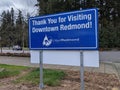 Redmond, WA USA - circa March 2021: View of the blue `Thank you for visiting` sign in a downtown Redmond parking lot Royalty Free Stock Photo