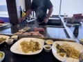 Redmond, WA USA - circa May 2023: Selective focus on a hibachi dinner being prepared inside a Japanese restaurant