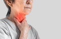 Redness at neck of Asian woman. Concept of sore throat, pharyngitis, laryngitis, thyroiditis, or dysphagia