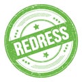 REDRESS text on green round grungy stamp Royalty Free Stock Photo