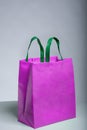 Reduce, Reuse, Recyclable Eco Friendly Non Woven Bag, Pink Color Bag and green handle