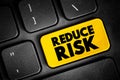 Reduce Risk text button on keyboard, concept background Royalty Free Stock Photo