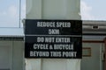 Reduce speed 5km do not enter cycle & bicycle beyond this point sign