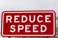 Reduce Speed warning Sign. Royalty Free Stock Photo