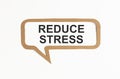 reduce stress, text on wite paper on withe