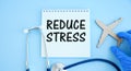 reduce stress words written on white medical card