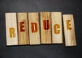 Reduce word letters on wooden blocks,. Resource conservation Reduce, reuse and recycle 3R concept
