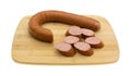 Reduced calorie kielbasa sausage on cutting board Royalty Free Stock Photo