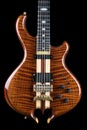 Highly Flamed Redwood on an Electric Bass Guitar - Unique shaped instrument Royalty Free Stock Photo