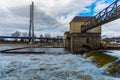 Redzinski weir over Odra river in front of Redzinski highway bridge at sunny cloudy day Royalty Free Stock Photo