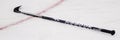 Reebok Hockey stick on the ice. Royalty Free Stock Photo